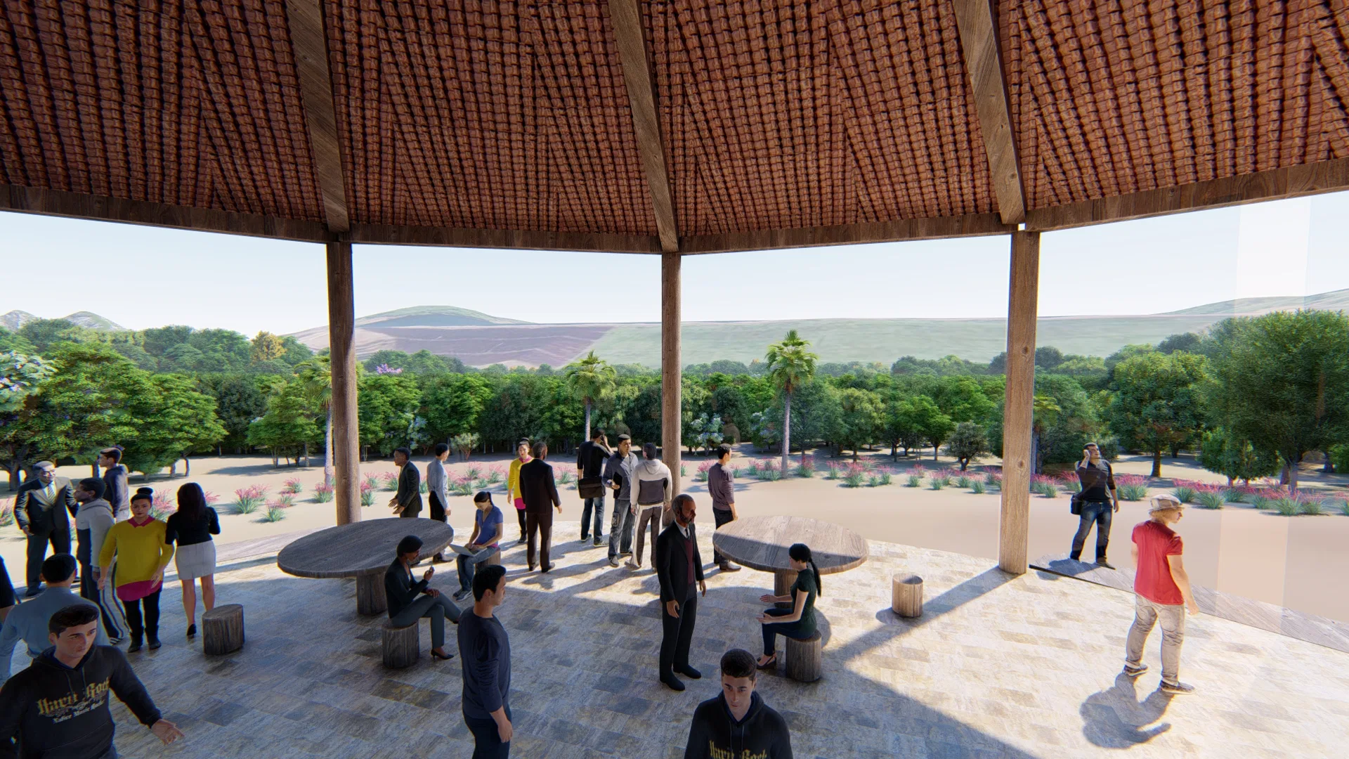 Interior do pavilhão com estrutura de madeira aparente, mesas redondas e banquetas de tronco, aberto para a paisagem de colinas