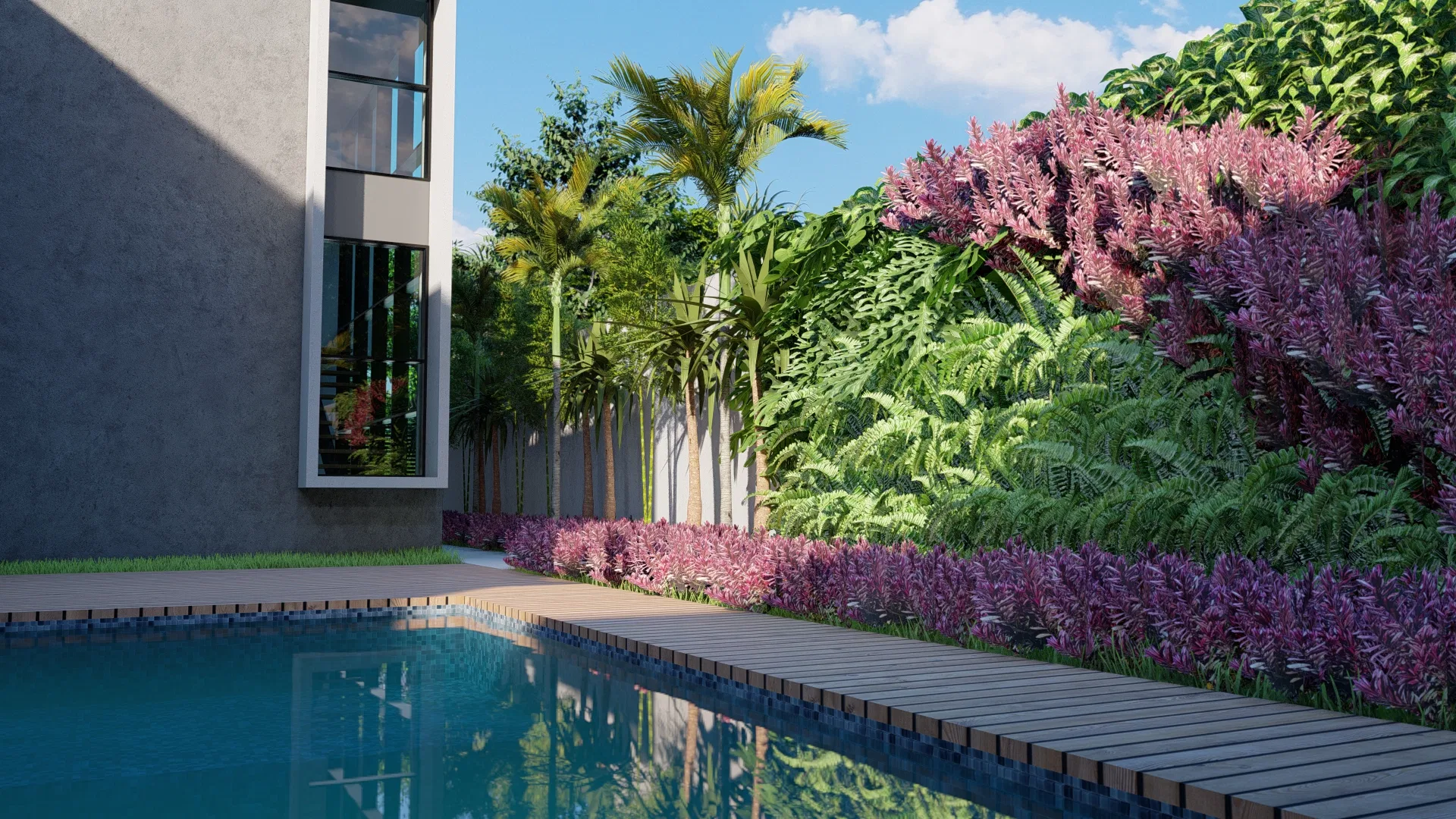 Piscina com passadeira de madeira ao lado da casa, bordas de flores magenta e samambaias e palmeiras alinhadas ao longo da divisa sob céu azul