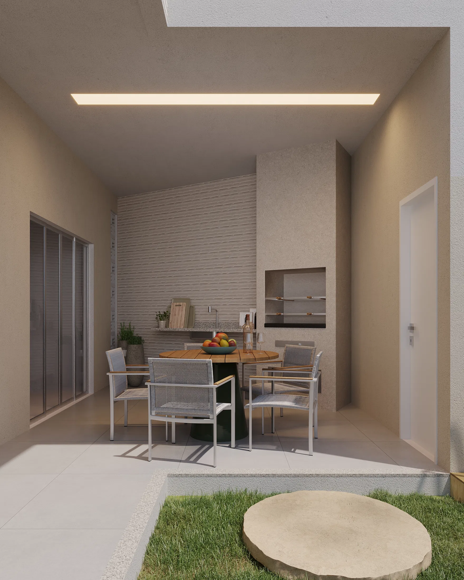 Área gourmet coberta com mesa redonda de madeira, cadeiras de fibra sintética, churrasqueira embutida e iluminação em sanca linear