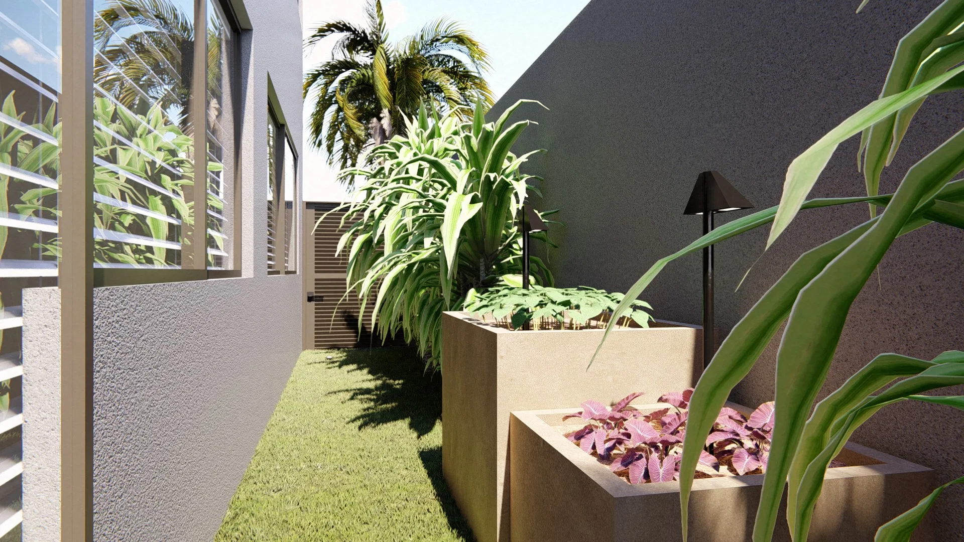 Canteiro elevado com folhagens tropicais e plantas de folhas rosadas junto a um corredor estreito com luminária de jardim