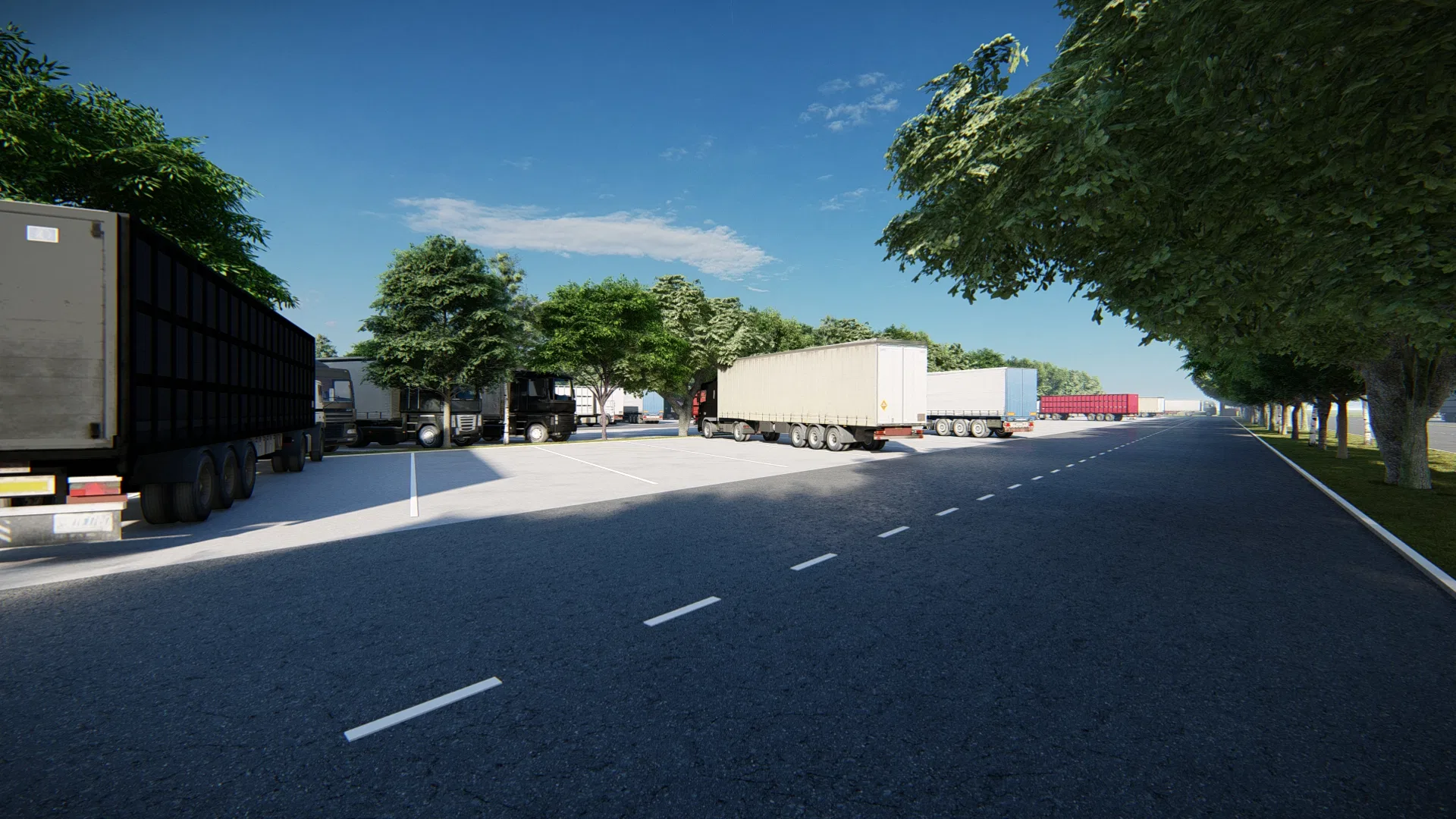 Pátio asfaltado com carretas e caminhões estacionados em fila, arborização ao longo da via e céu azul limpo
