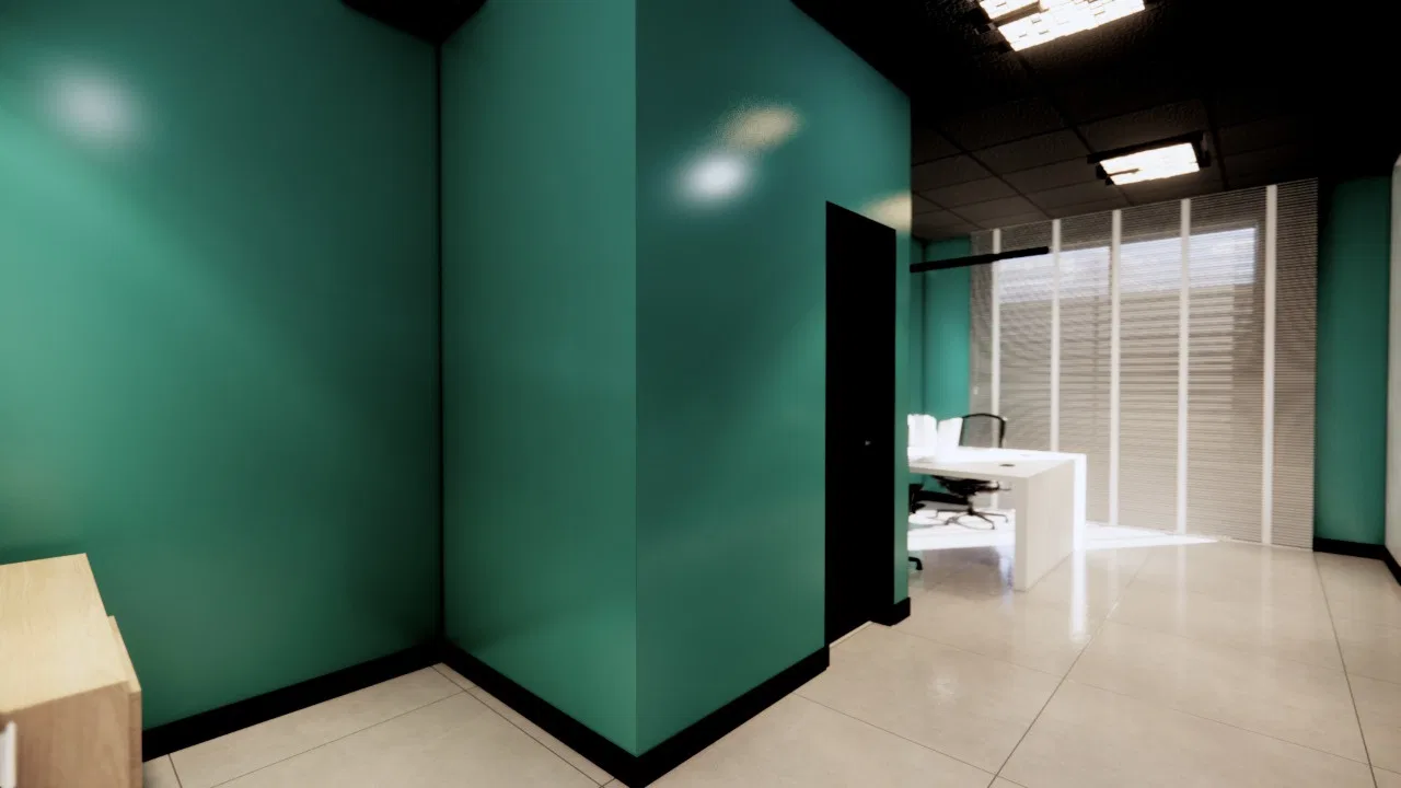 Sala individual de paredes verde-azuladas com mesa branca, cadeira ergonômica e persianas filtrando a luz junto ao teto escuro