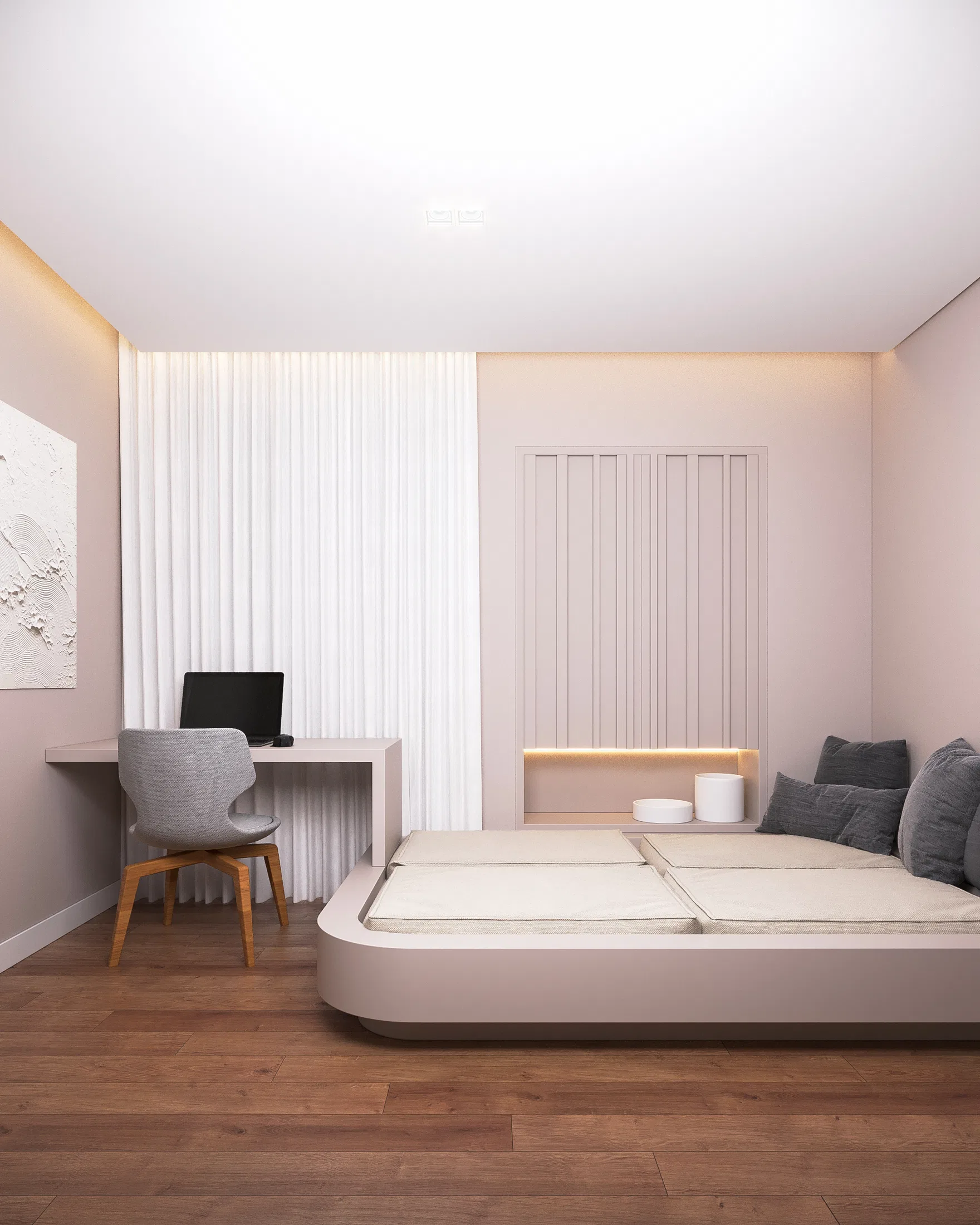 Quarto em tons de rosa com cama de base arredondada, marcenaria ripada e escrivaninha branca junto à cortina