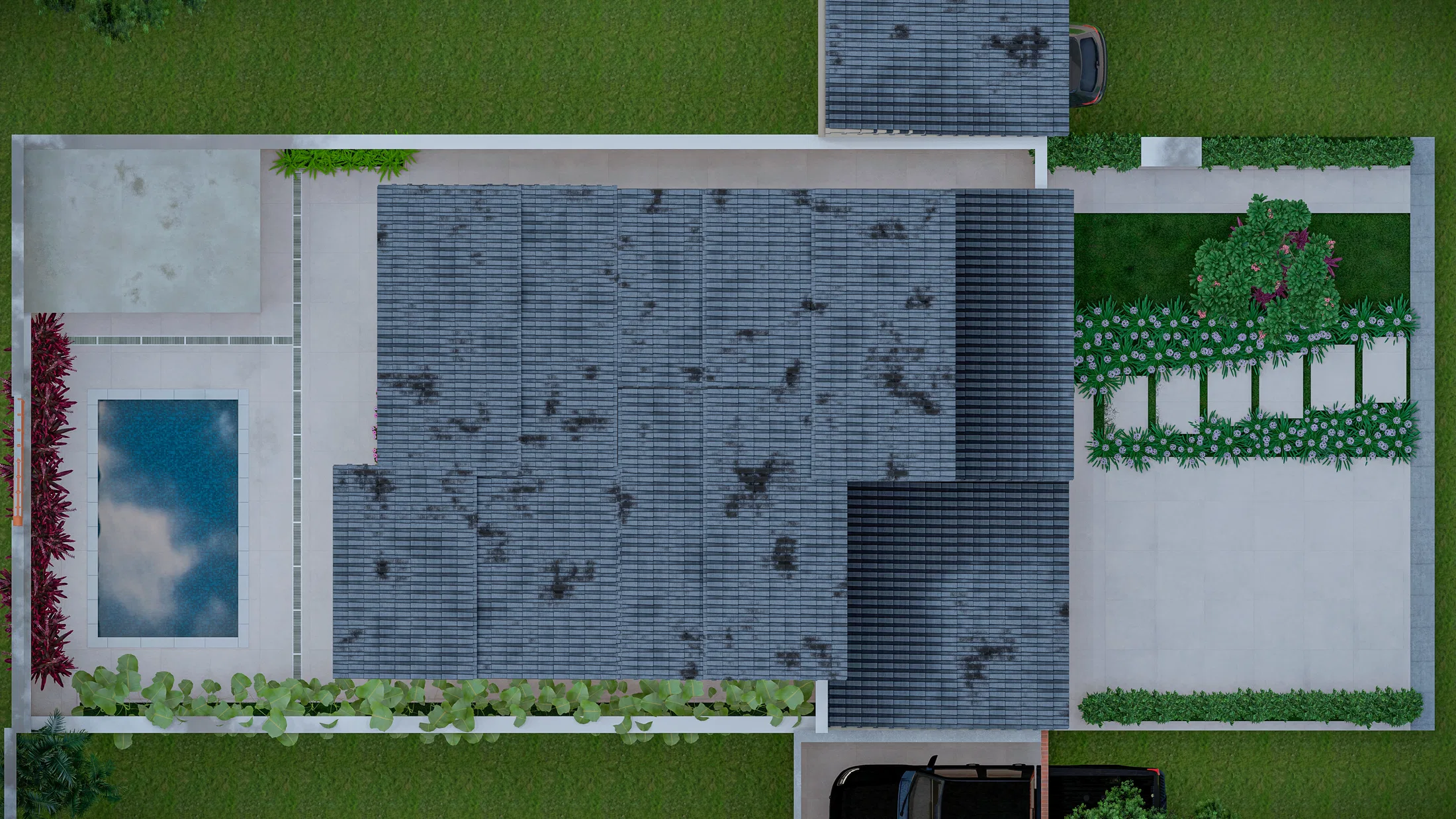 Vista aérea do telhado com placas solares, piscina e canteiro floral ao lado da garagem