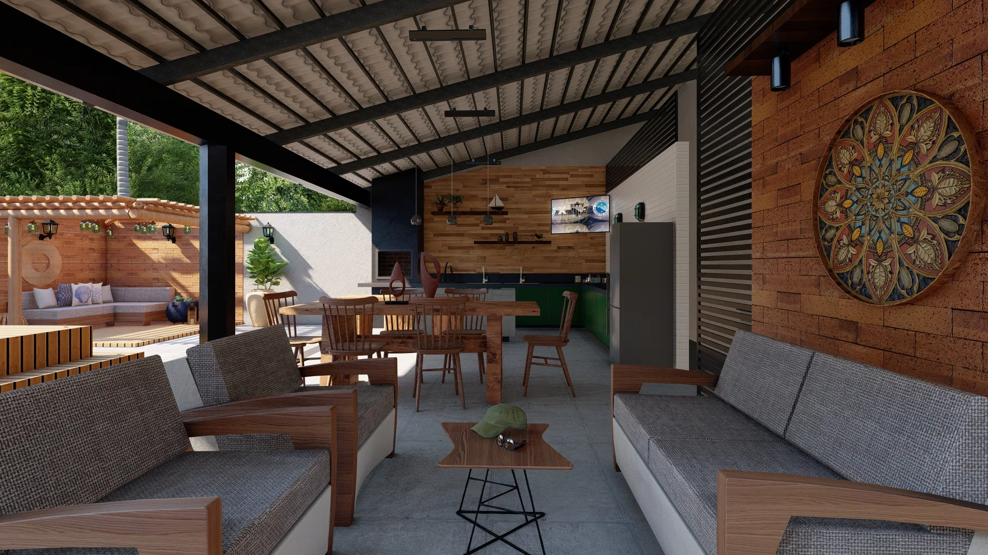 Estar gourmet coberto com dois sofás cinza, mesa de jantar de madeira, cozinha ao fundo e grande painel circular na parede de tijolinho