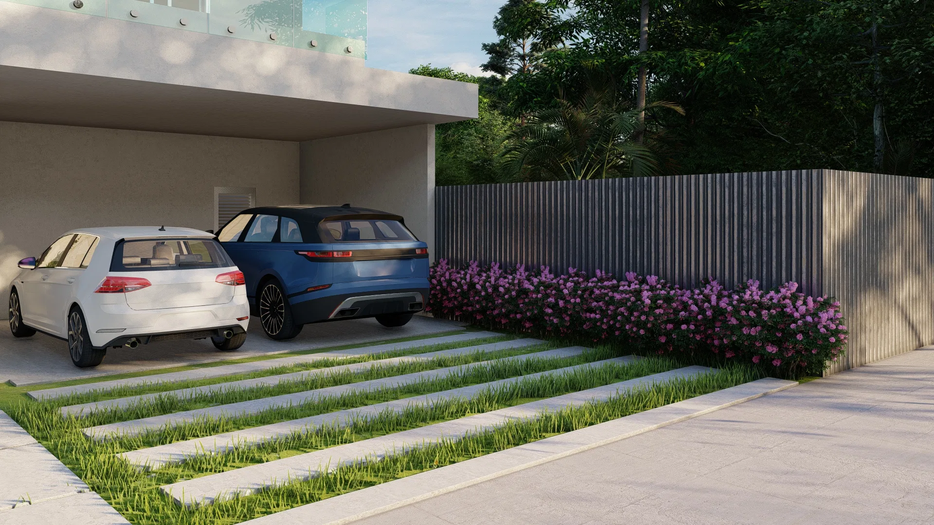 Acesso de veículos em faixas de grama e placas de concreto, com sebe de flores lilases diante de muro de ripas escuras