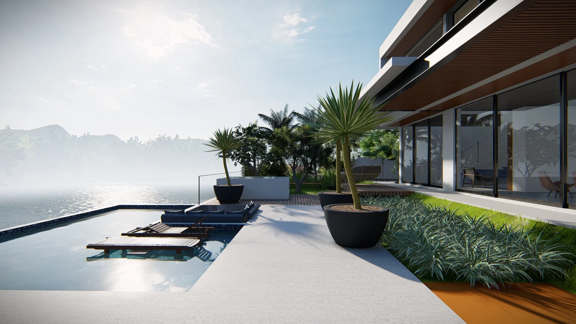 Deck da piscina com espreguiçadeiras e vasos de palmeira, vista aberta para um espelho d'água sob luz suave e neblina