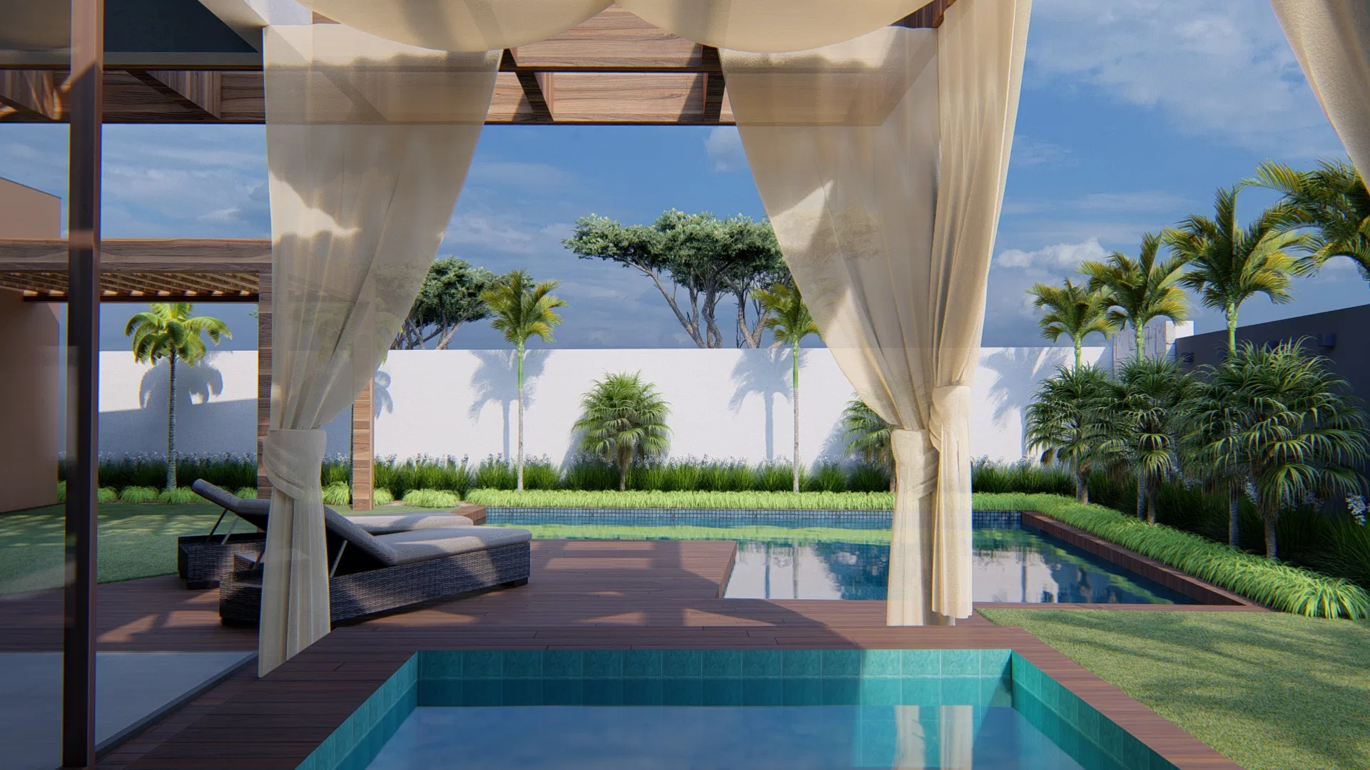Deck de piscina visto sob pergolado de tecido branco, com chaise de vime, duas lâminas d'água e uma árvore de copa ampla ao fundo