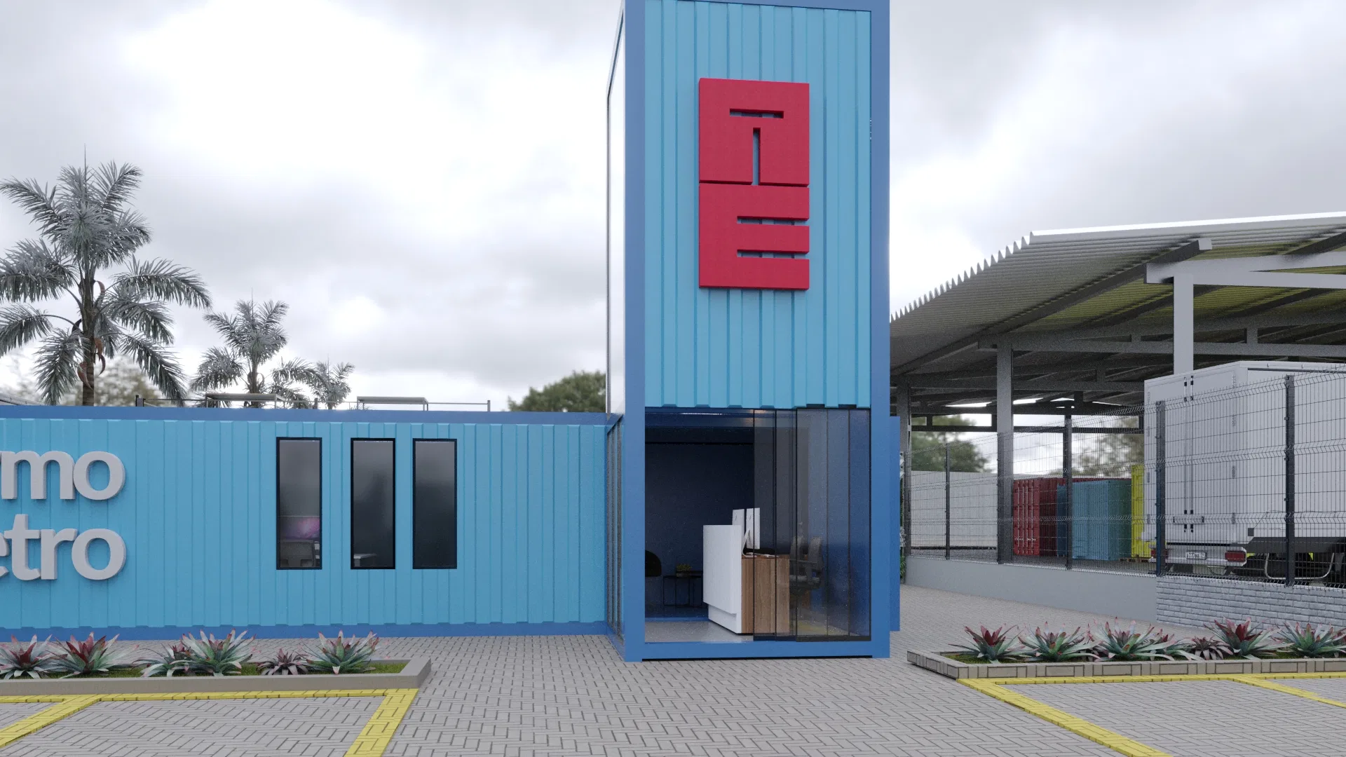 Ângulo lateral da torre de entrada com logotipo vermelho e portas de vidro, container azul com janelas à esquerda e área de docas cobertas ao fundo à direita