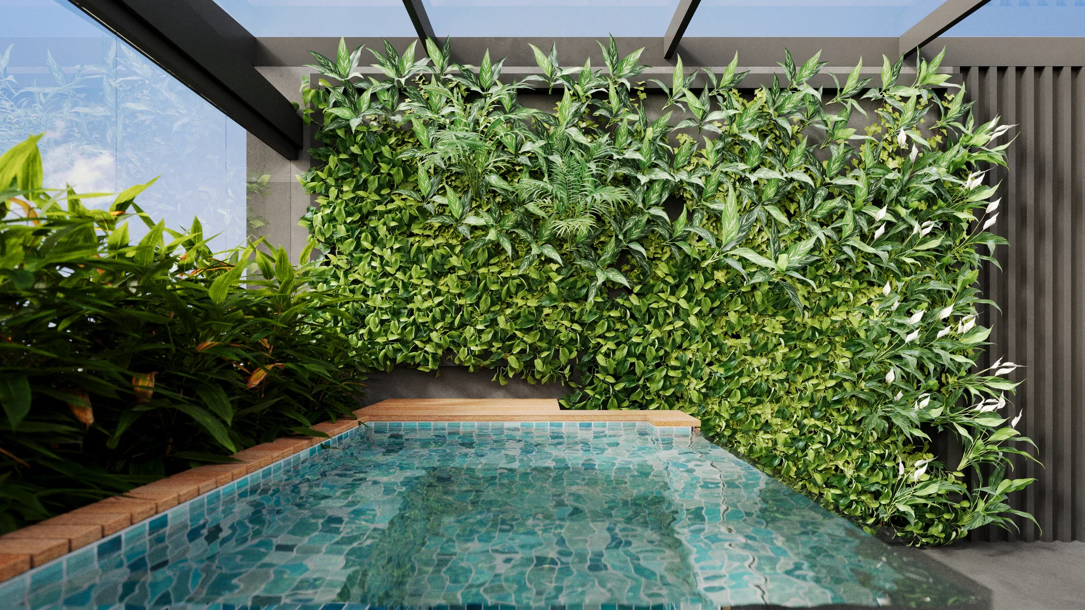Piscina de mosaico verde recuada contra amplo jardim vertical, com deck de madeira e vegetação tropical ao lado.