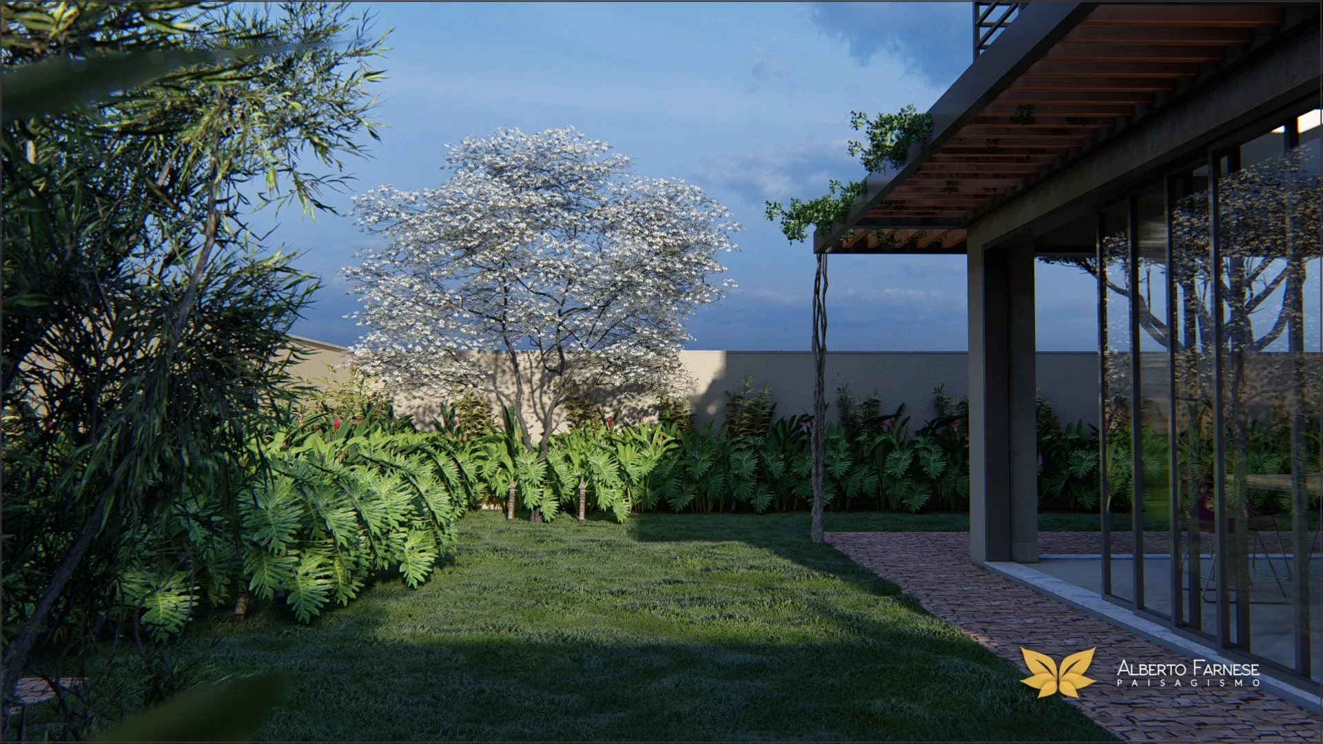 Jardim de fundo ao entardecer com árvore florida branca, canteiro de bambu e sala de estar avistada ao fundo sob pergolado