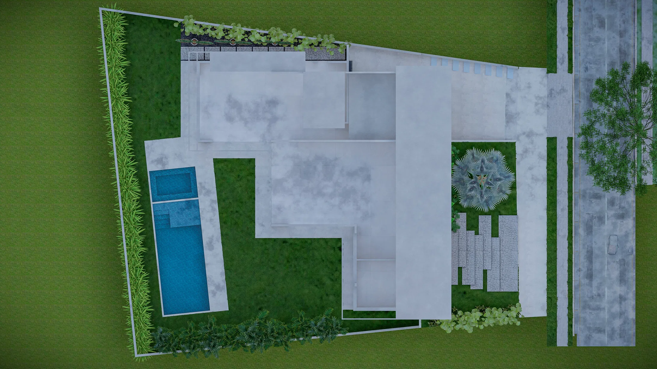 Vista aérea do terreno mostrando telhado da casa, piscina lateral, acessos em pedra e gramado emoldurado por vegetação nas laterais.