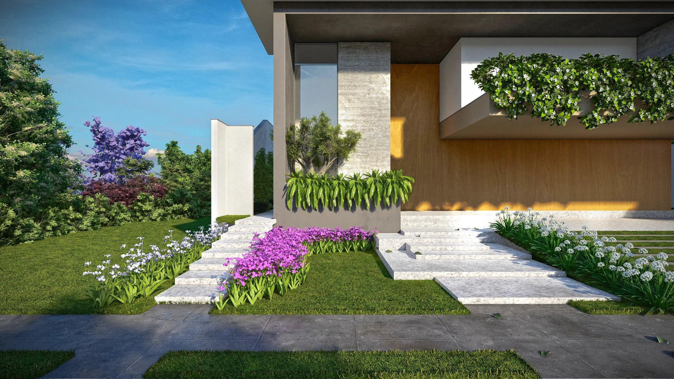 Jardim de entrada com degraus de pedra clara, floradas roxas e brancas, oliveira em jardineira e árvore de flores lilás ao fundo.