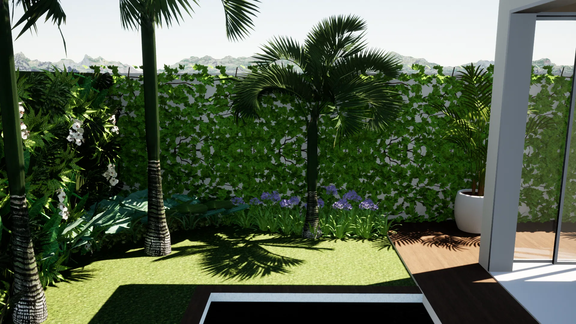 Recanto dos fundos com palmeiras altas, muro coberto por jardim vertical, maciços de agapantos azuis e a borda escura da piscina junto ao deck.