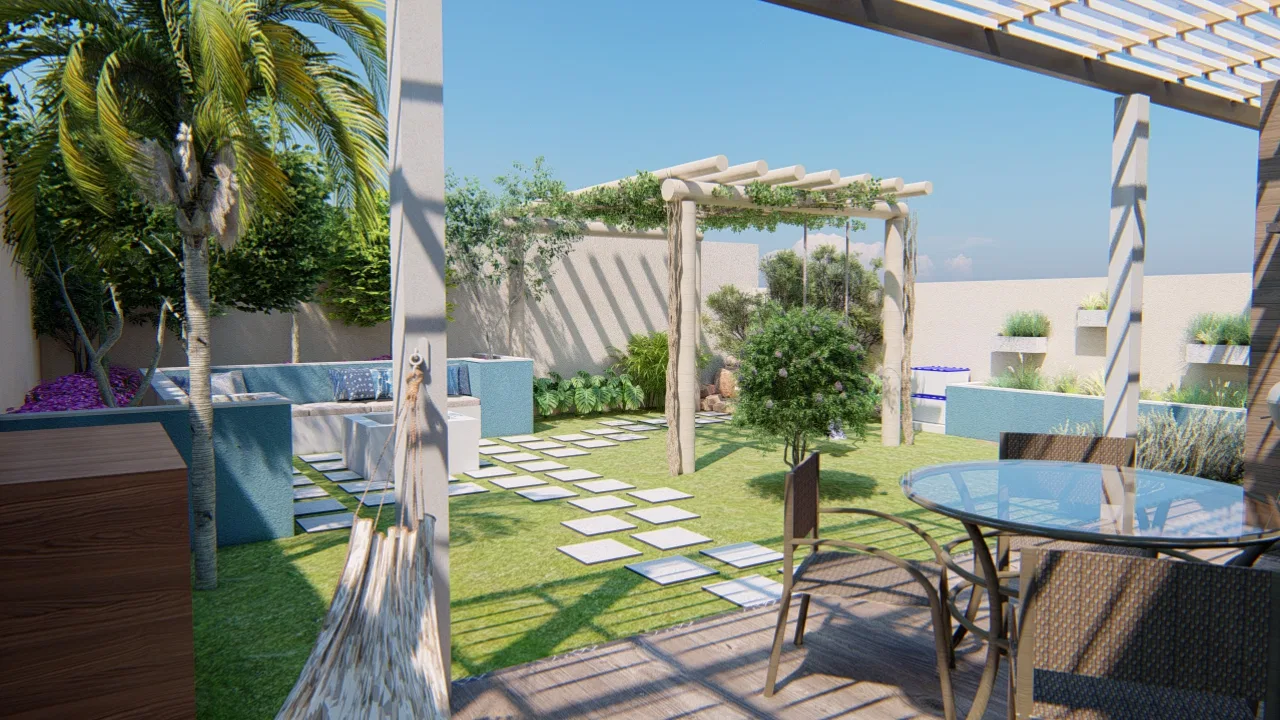 Área de lazer com pérgola, gramado e passadeira de placas, banco com almofadas e mesa de vidro com cadeiras de fibra