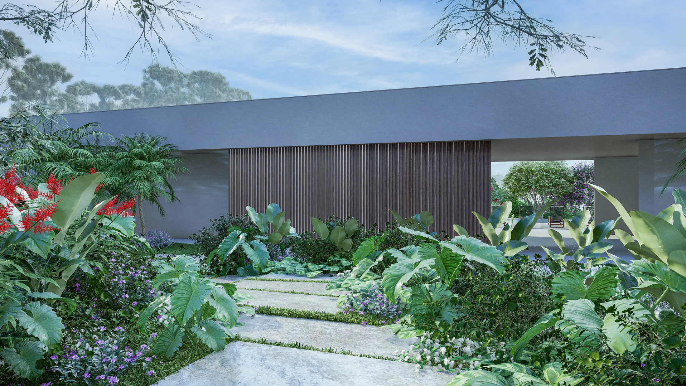 Passadeira de pedra levando a uma casa moderna de ripas de madeira, entre folhagens tropicais e uma planta de flores vermelhas, em luz fria.