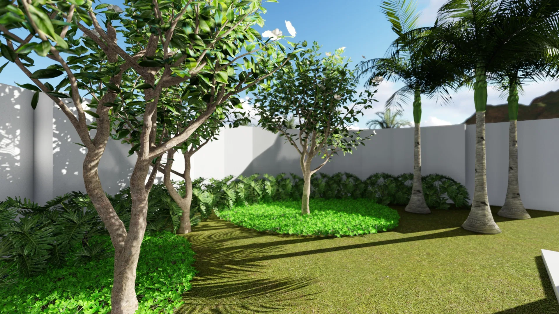 Jardim arborizado com árvores de tronco claro, maciço de forração verde-vivo e palmeiras alinhadas junto ao muro, sob céu azul