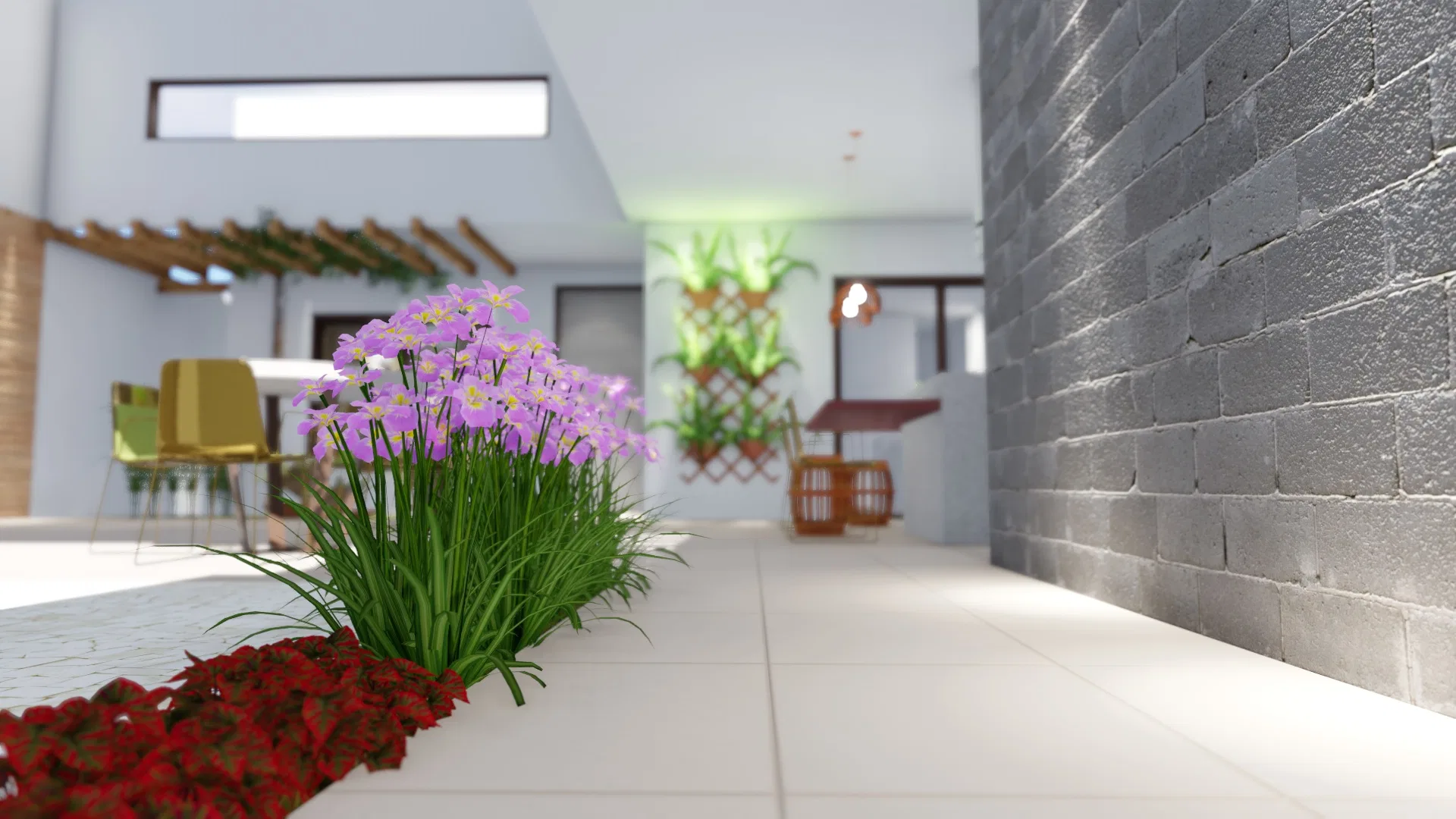Canteiro rente ao piso branco reúne flores lilases e vermelhas, com o muro de bloco aparente cinza à direita e as refeições ao fundo.