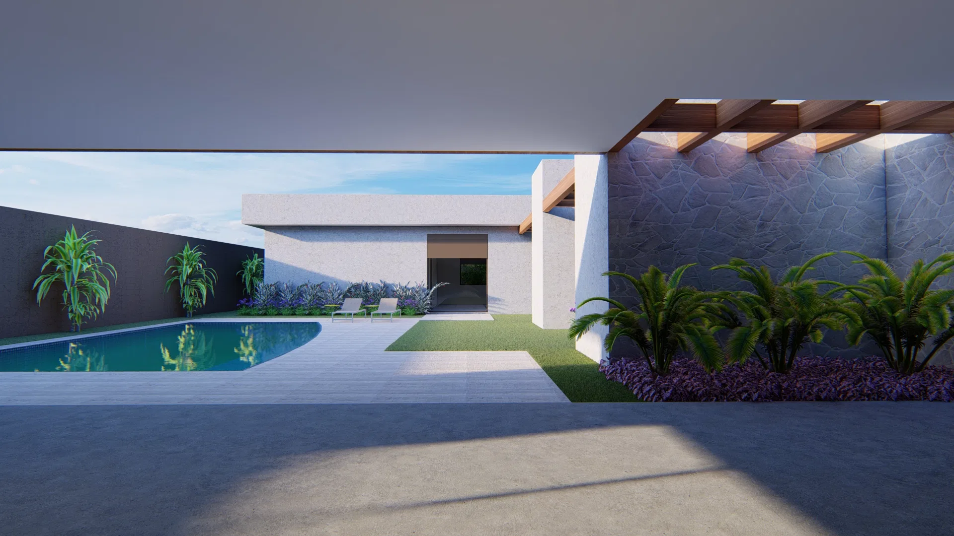 Quintal com piscina de traçado curvo e deck de madeira, parede de pedra com pergolado, cycas e maciços arroxeados junto aos volumes claros